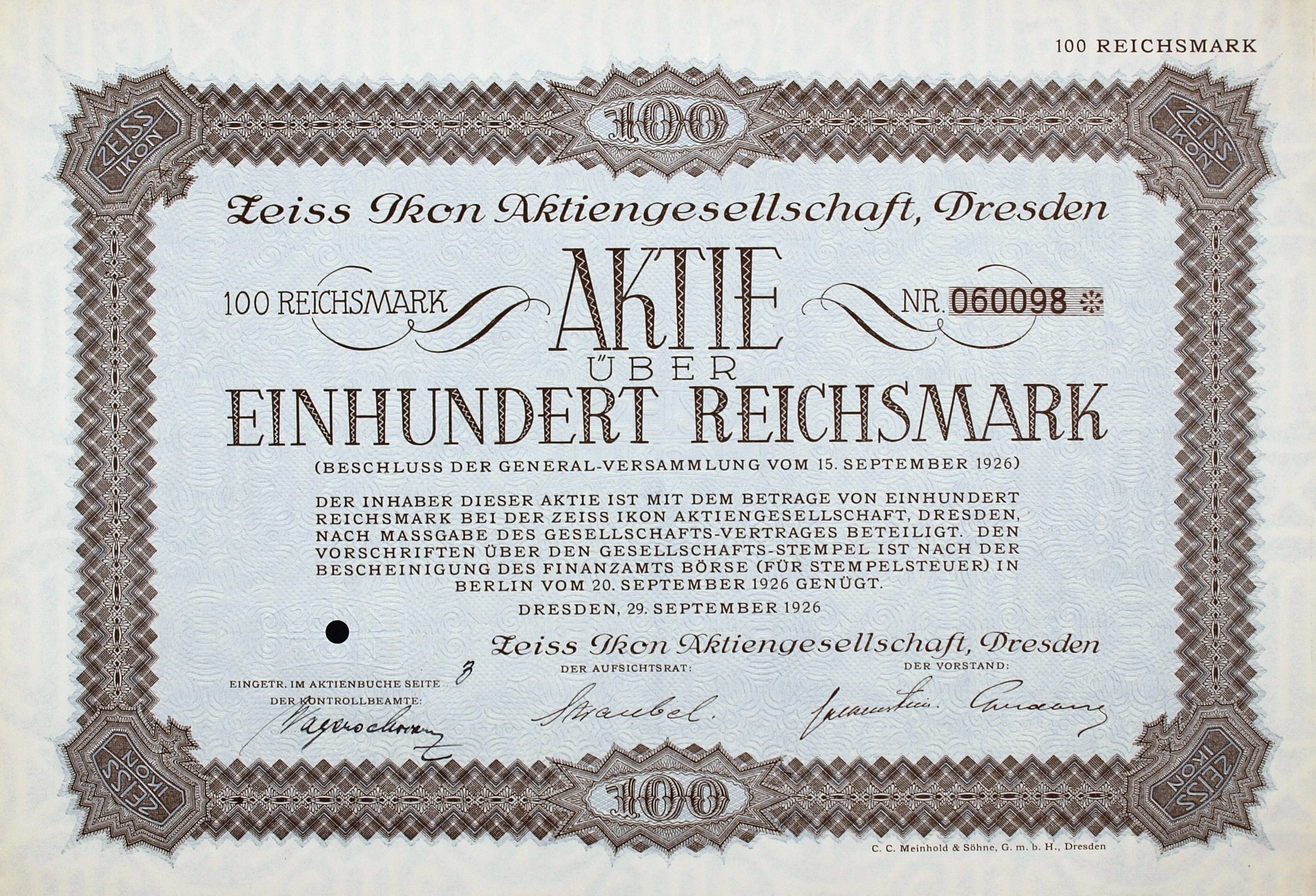 Altes deutsches Aktienzertifikat über 100 Reichsmärker mit schwarzem Rand und deutscher Beschriftung.