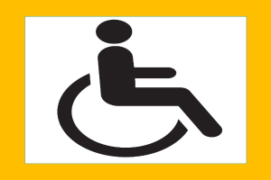 Gelb-weißes Behindertenparkschild mit einem schwarzen und weißen Rollstuhl-Symbol.