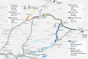 Eine detaillierte Stadtkarte, die die Bahnroute von München nach Frankfurt hervorhebt, zeigt Haltestellen, umliegende Gebiete und Text mit Bahninformationen.