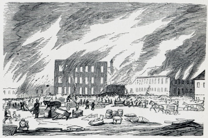 Eine Schwarz-Weiß-Zeichnung einer Menge vor einem brennenden Gebäude mit aufsteigendem Rauch, beschriftet mit "Brand des New Yorker Aktienmarkts".