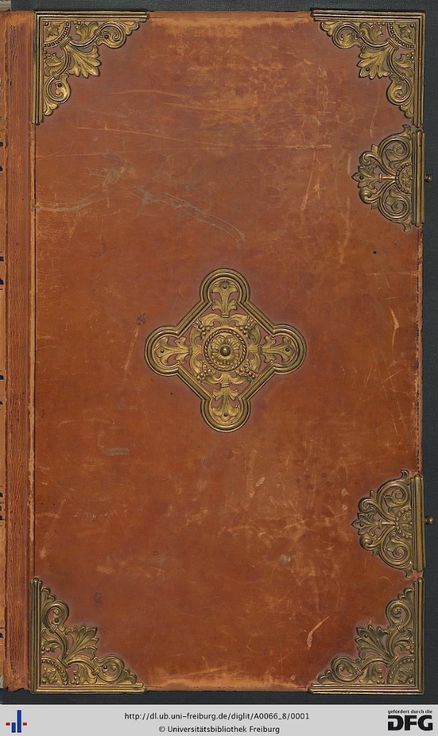 Altes Buch mit braunem Einband und goldener Prägung auf schwarzem Hintergrund, Text unten lautet "Universitätsbibliothek Freiburg".